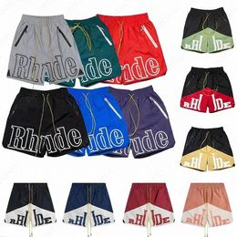 Rhude Shorts Graphic Rhude Mens Basketball Short Designers Nieuwste beperkte broek Luxurys Summer Beach Palm Letter Mesh Street Fashion Sweatpants Oversi G9C3#