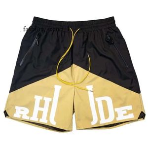 Rhude Shorts Hommes Designer Court Hommes Ensembles Survêtement Pantalon Lâche et Confortable Mode Soyez Populaire 2023 Nouveau Style S M L Xi Polyester Lâche Meilleure Qualité Rhude Chemise 6848