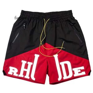 Rhude Shorts Hommes Designer Court Hommes Ensembles Survêtement Pantalon Lâche et Confortable Mode Soyez Populaire 2023 Nouveau Style S M L Xi Polyester Lâche Meilleure Qualité Rhude Chemise 8513