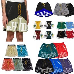 Rhude pantalones cortos para hombres Shorts Diseñador Shorts Summer Womens Investres informales Impresión de la impresión de natación Size S-XL Hombre impermeable Shorts secos rápidos Relechas transpirables Jogging