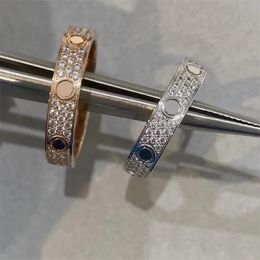 diseñador de anillos Anillo de amor para mujer Diseñador para hombre Anillo de corazón Joyería de pareja Anillo de acero de titanio Moda Clásico Oro y plata Tornillo de diamante rosa Múltiples opciones de tamaño