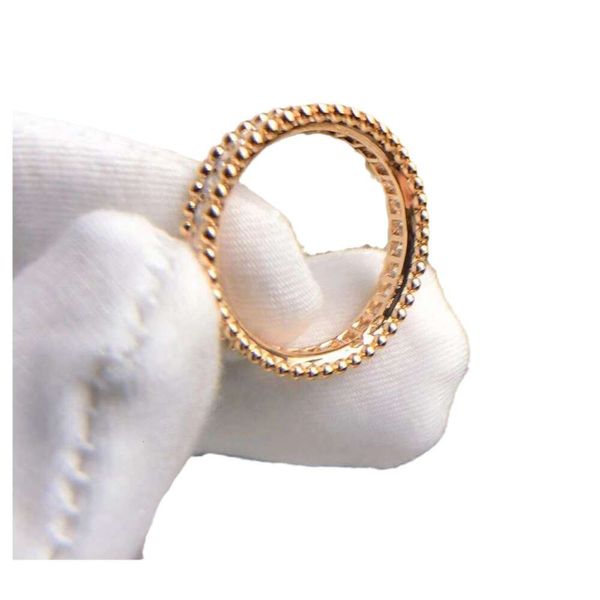 Anillo Van-Clef Arpes Diseñador Mujeres Anillos de alta calidad Caleidoscopio Con cuentas Anillo de diamantes completo Espesor de oro en V para mujer 18K Anillos masculinos y femeninos brillantes exquisitos