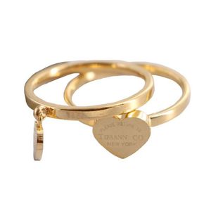 Anneaux 316L Titanium Steel Gold plaqué Love Ring pour femmes Designer Heart Luxury Moisanite Diamond Channel Bijoux Bijoux Medusa Whol Dhsld