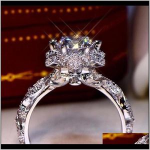 Ringen Drop Levering 2021 Unieke Luxe Sieraden Ronde Cut White Topaz CZ Diamond Gemstone Dames Bruiloft Engagement Bloem Ring Gift N1CEZ