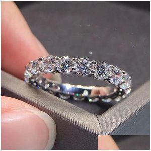 Rings Eternity M Moisanite Diamond Ring 100% réel 925 Sterling Sier Party Band for Women Men Engagement Bijoux Drop Livraison DHE0T