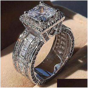 Anneaux Unique Bijoux De Luxe Princesse Coupe Whie Topaze Cz Diamant Fête Éternité Femmes Bague Cadeau Livraison Directe Dhv8C