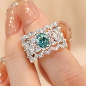 Anneaux Vintage Hollow Design 925 Silver Sea Blue CZ Crystal Rendable Rings Madies Bling Crystal Engagement Dinger Ring Trend Bijoux