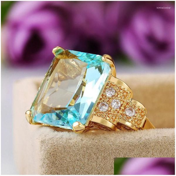 Anneaux Zhouyang bague pour femmes de luxe couleur or clair bleu Zircon sur les doigts bijoux cadeau en gros accessoires Kbr41 livraison directe Dhj87