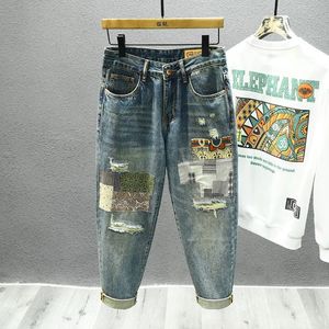 Jeans en détresse déchiré pour hommes Streetwear Patchwork Fashwork Hole Hip-hop Baggy Casual Harem Retro Retro Denim Pantalons mâles 240426