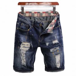 Ripped Patch Jeans courts pour hommes 2023 Été Raggedy Five-cent Mendiant Denim Pantalon Style britannique Haute Qualité Tendance Jeans pour hommes A0xR #