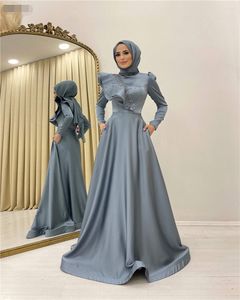 Robes De Soirée Manches Longues Robes De Bal Musulmanes Robes De Soirée Avec Poche Satin Cristal Perlé Une Ligne Col Haut Arabe Dubai Robes De Soirée Formelles Pour Femmes