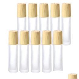 Rouler sur des bouteilles en gros de 5 ml 10 ml Bouteille grostée rouleau en verre transparent avec capuchon en plastique à grain de bois pour livraison de gouttes d'huile essentielle DHF9A