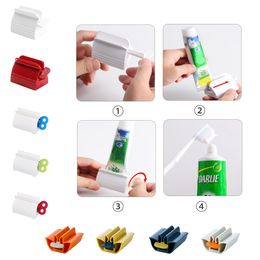Dispositivo de pasta de dente rolante Tubo dispensador titular multifuncional plástico limpador facial espremedor para acessórios de banheiro