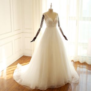 Robes de mariée robe de bal romantique perles scintillantes paillettes illusion manches longues à lacets dos balayage train tulle dentelle robes de mariée plus la taille
