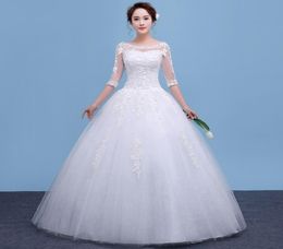 Vestidos de novia de vestidos de pelota de cuello romántico con aplicaciones 2018 Lace Tul Tul Wedding Dress Lace Up2622131