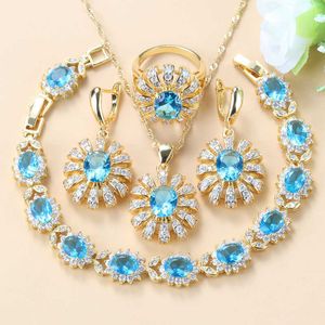 Romantique ciel bleu Zircon fête de mariage grands ensembles de bijoux couleur or jaune quatre pièces costume balancent boucles d'oreilles/bracelet et bague H1022