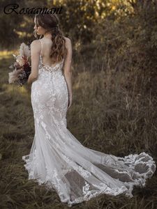 Romantische spaghetti -riemen Backless Mermaid Wedding Jurken Illusie Appliques Lace Bruidaljury Robe de Mariee