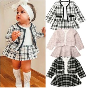 Barboteuses 2pcs automne hiver printemps fête bébé filles vêtements manteau à carreaux hauts tutu robe tenues formelles adaptées pour 0 6 ans 231115