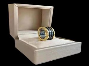 Rose Gold Spring Pressable Ring Zwart-witte bandringen Keramische dubbele paarring Highend kwaliteit galvaniseren nieuwe collectie En6887125