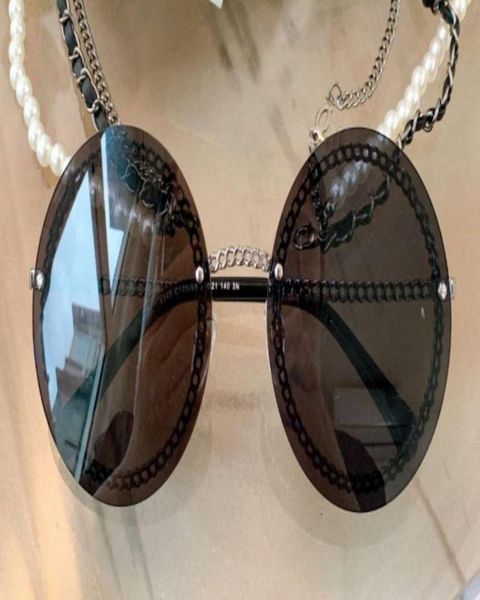 Lunettes de soleil rondes Champagne Black Gold Chain sans bord de bord Femmes Fashion Sun Glasses avec Box2014326