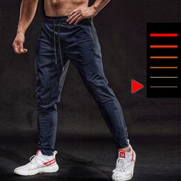 Pantalon de course BINTUOSHI pantalon de Sport élastique respirant hommes poches zippées pantalon d'entraînement Joggings pantalon de Fitness pour hommes