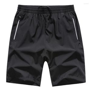 Running shorts Quick Drying Men 7xl 8xl Loose Sweatpants Polyester Ademend strand Korte Zip Pocket Jogger Gym Sport Man