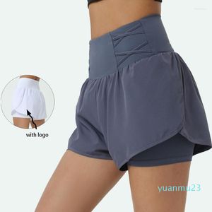 Pantalones cortos para correr con logotipo Atlético Dos piezas Bolsillo Pantalones de yoga Cintura alta Estiramiento cruzado Gimnasio Bicicleta Tenis Golf Culottes Mujeres