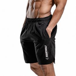 Short de sport en cours d'exécution Hommes Gym Fitn Bodybuilding Pantalon court Été Tennis Homme Jogging Marath Entraînement Entraînement Marque Shorts r6C5 #