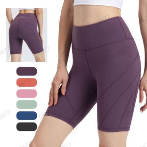 Pantalon de yoga en cours d'exécution avec le style sportif Double face brossé Slim Fit Pantalon moyen taille haute élastique Sports de plein air Capris pour les femmes