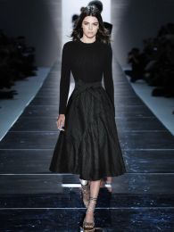 Runway Catwalk Nouveau printemps femmes de haute qualité mode fête noir tricot élasticité tempérament élégant bureau jolie robe mi-longue