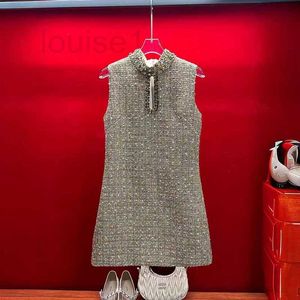 Runway -jurken Designer merk Miu Style grove tweed glanzende zijden mouwloze vestrok Handgemaakte kralen en diamant ingelegd socialite temperamentjurk