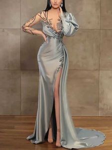 Runway -jurken Silver Mermaid Lange mouwen Eveningjurken Dragen Illusie Kristal kralen High Side Split Floor Lengte feestjurk Prom -jurken