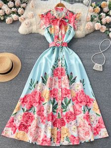 Piste d'été vacances robe à fleurs femmes sans manches noeud papillon cou simple boutonnage imprimé fleuri ceinture Boho Maxi fête robes 240113