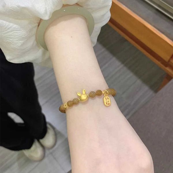s Light Luxury Female Golden Rabbit Nafu Brand Sugar Hetian Jade Bracelet est un cadeau pour la petite amie de l'année de vie du lapin