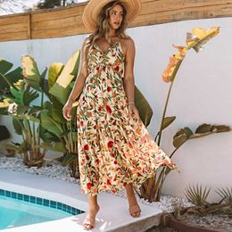 Nieuw zomerproduct draagt lange damesrok, sexy bloemenprint, houten oorrand, mouwloze jurk met slinger