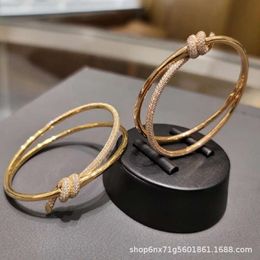 S925 Silver TiffanyJewelry Heart Pendants Bracelet à arc torsadé en diamant complet avec un luxe léger et un sens avancé