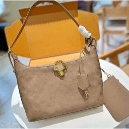 Sac Sport Sac Designer Retro-Chic Handbag Womens Womens Luxurys DrawString Sac amovible Polie zippé gracieuse en relât en cuir réel sac à bandoulière portefeuille