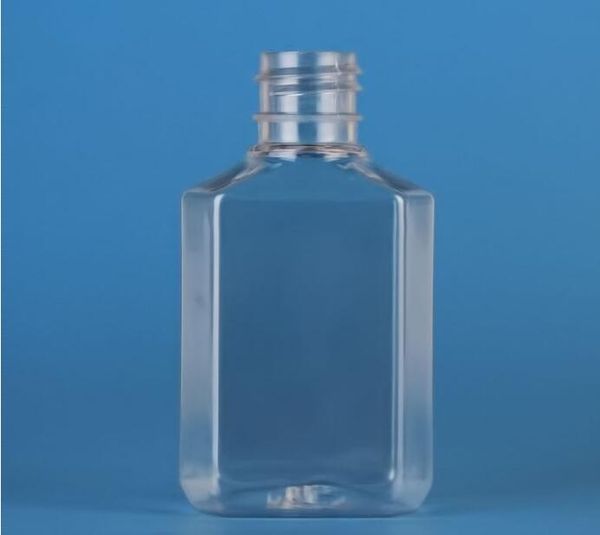 Venta de botella recargable de alcohol vacía de plástico de 60 ml, fácil de llevar, botellas de desinfectante de manos de plástico PET transparente para viaje líquido E