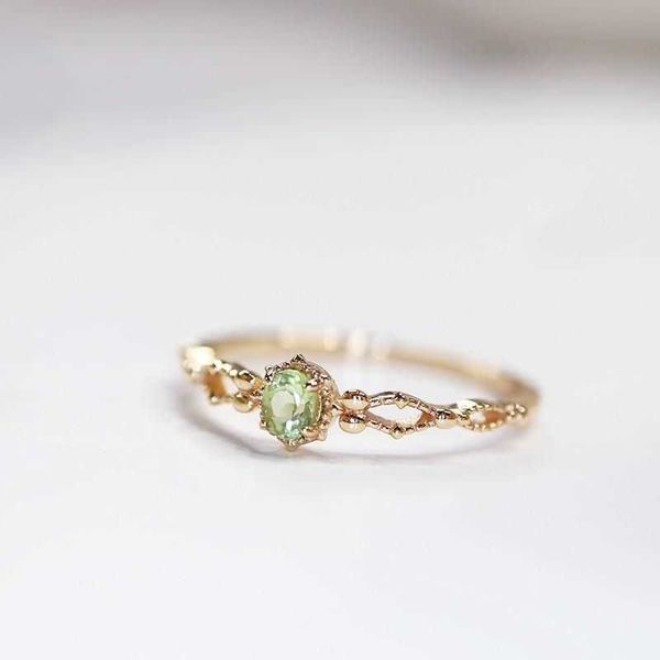 Bague imitation olivine pour femme, anneau ajustable en zircone avec sourire ajouré, design de niche plaqué or