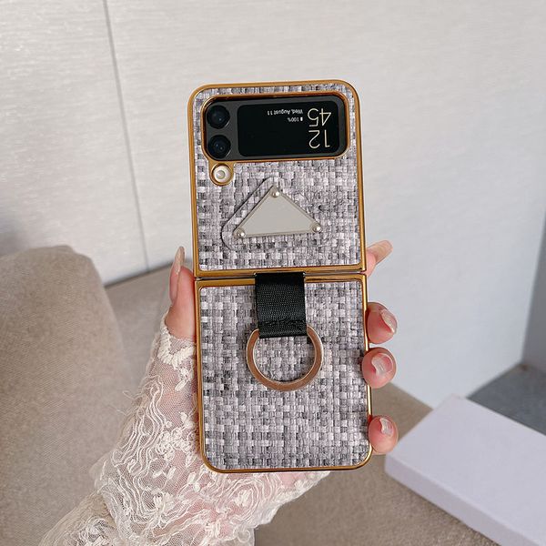 Samsung Galaxy Z Flip 4 3 Fundas para teléfonos Diseñador Patrón de tejido Cuero de PU Lujo Cromado Parte posterior Cubierta de parachoques Correa Cordón Soporte para anillo de dedo Fundas Coque Shell Gris
