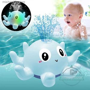 Sable Player Water Fun Baby Shower Toys Water Spray Childrens Balles de baleines électriques LED LEIL avec éclairage et musique de musique Q240426