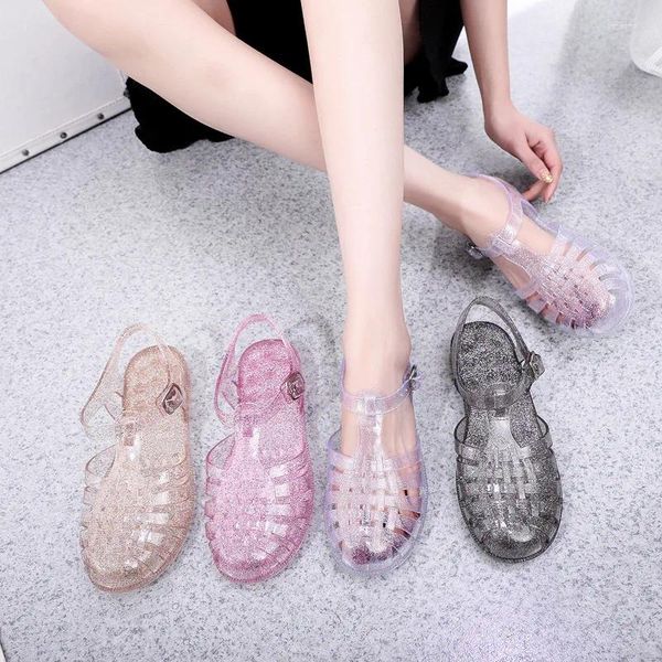 Sandalias 2024 verano mujeres zapatos de jalea mujer cabeza redonda sandalia transparente dama bling mujeres planas plásticos casuales