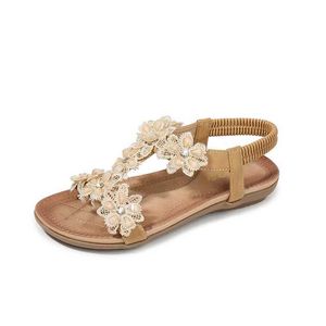 Sandalen BEYARNEComfortable Platte Schoenen Dames Grote Maat Zomer Boheemse Bloem Strass Strand Thongs H240328FDHN