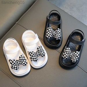 Sandalen kindersandalen voor meisjes nieuwe Koreaanse stijl eenvoudige zomer 2023 mode prinses open-teen dambord boog causale strandschoenen w0327