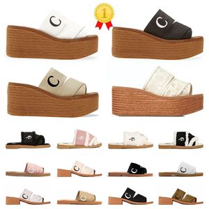 Sandalen Beroemde ontwerper Dames Woody sandalen Muilezels platte dia's Lichtbruin beige wit zwart roze Stof canvas pantoffels zomerse buitenschoenen voor dames