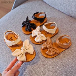 Sandalen Girls Sandalen 2021 Zomer Nieuwe kinderschoenen Koreaanse baby Bowknot Soft Bottom Fashion Non-Slip Princess Shoes Sandals E05104 W0217