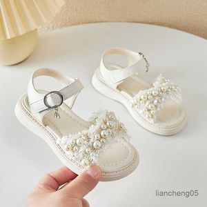 Sandales filles sandales 2023 nouveau été princesse blanc sandales perle plate-forme bébé plage chaussures antidérapant plat filles sandales décontractées