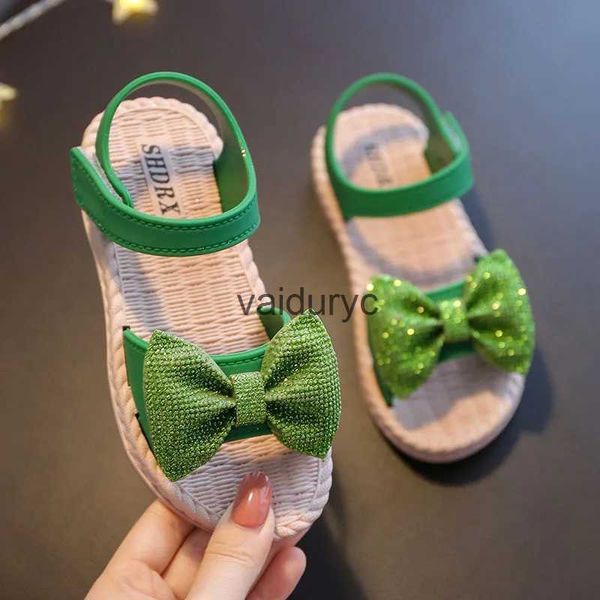 Sandals Chaussures pour enfants Summer pour les filles arc non glissant sans glissade à semelle molle Solide coréen Ldren Sweet Princess Beach H240506