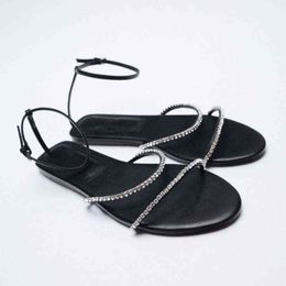 Sandalen schoenen 2022 lente zomer product strass dunne riem platte enkel T-vormige vrouw slippers All-match vrouw 220412