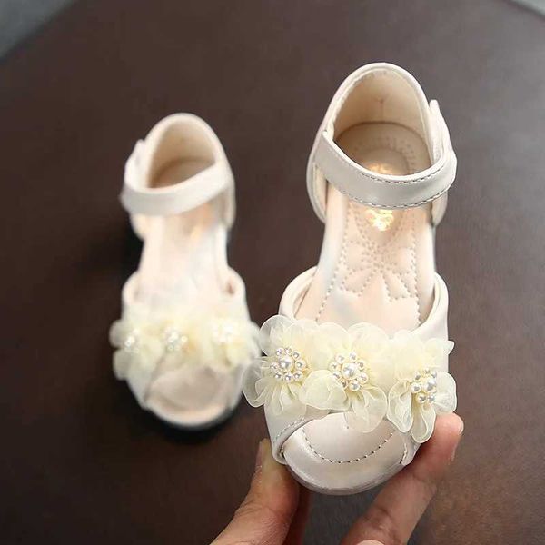 Sandales Summer Girls Sandales plates Fashion Pearl Flower Girls Princess Chaussures Toddler Baby Girl Chaussures Flats Talales Sandales 2-8Y Taille 22-31